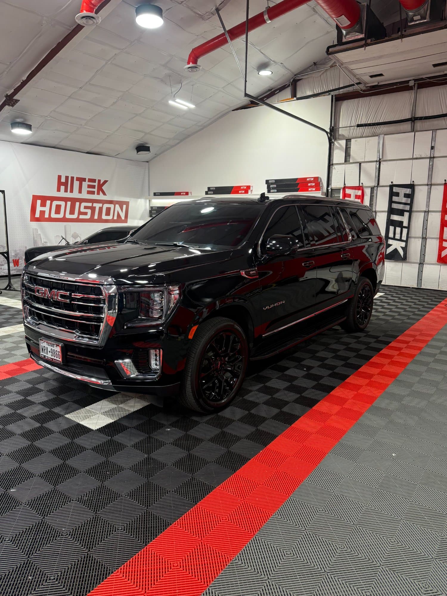 GMC Yukon with commercial window tint - 713 Tint Lab Houston fleet tinting